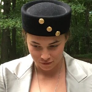 Elegant Black Pillbox Hat with Gold Accents